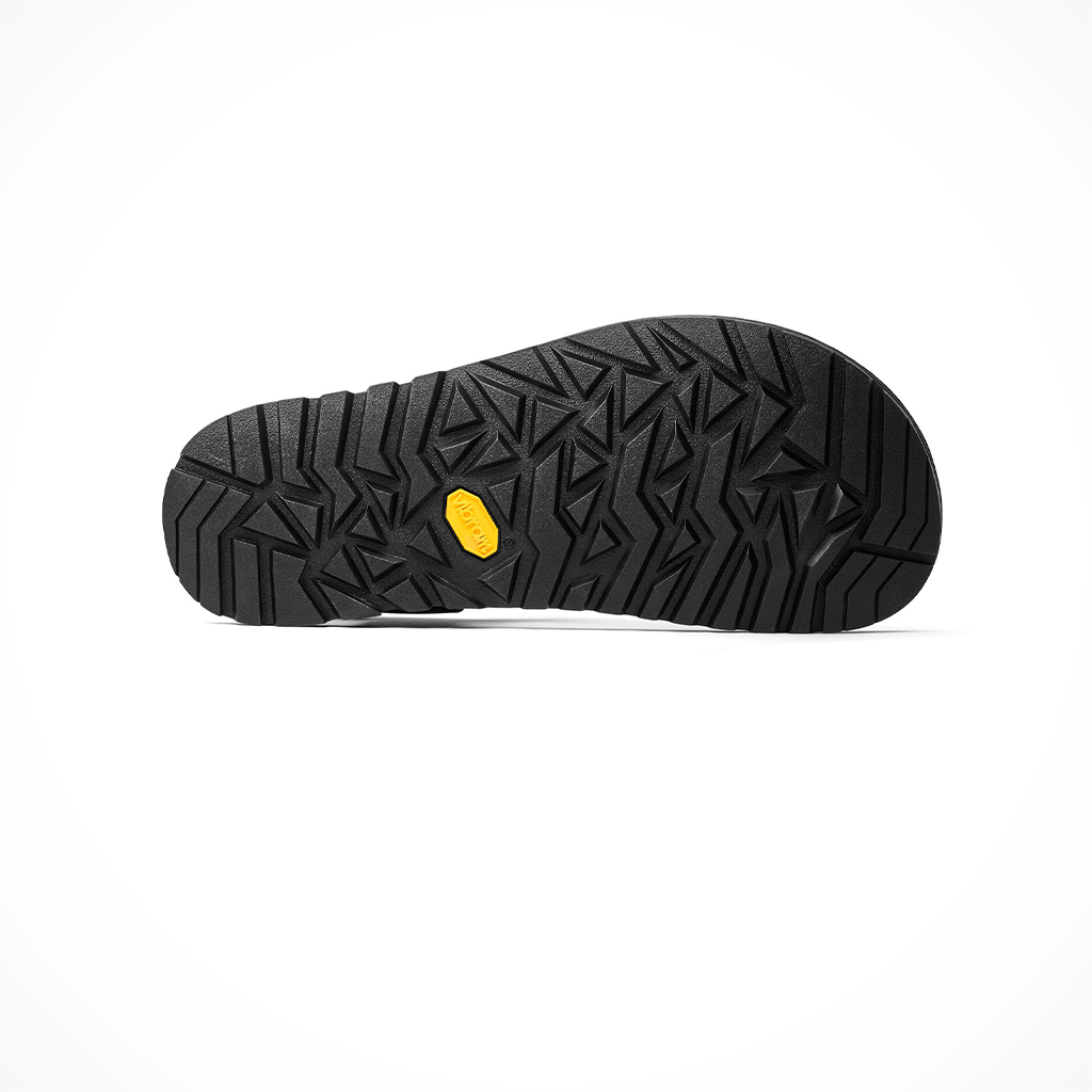 Product image: Bedrock Unisex Cairn Evo Black, showing the outsole tread pattern.