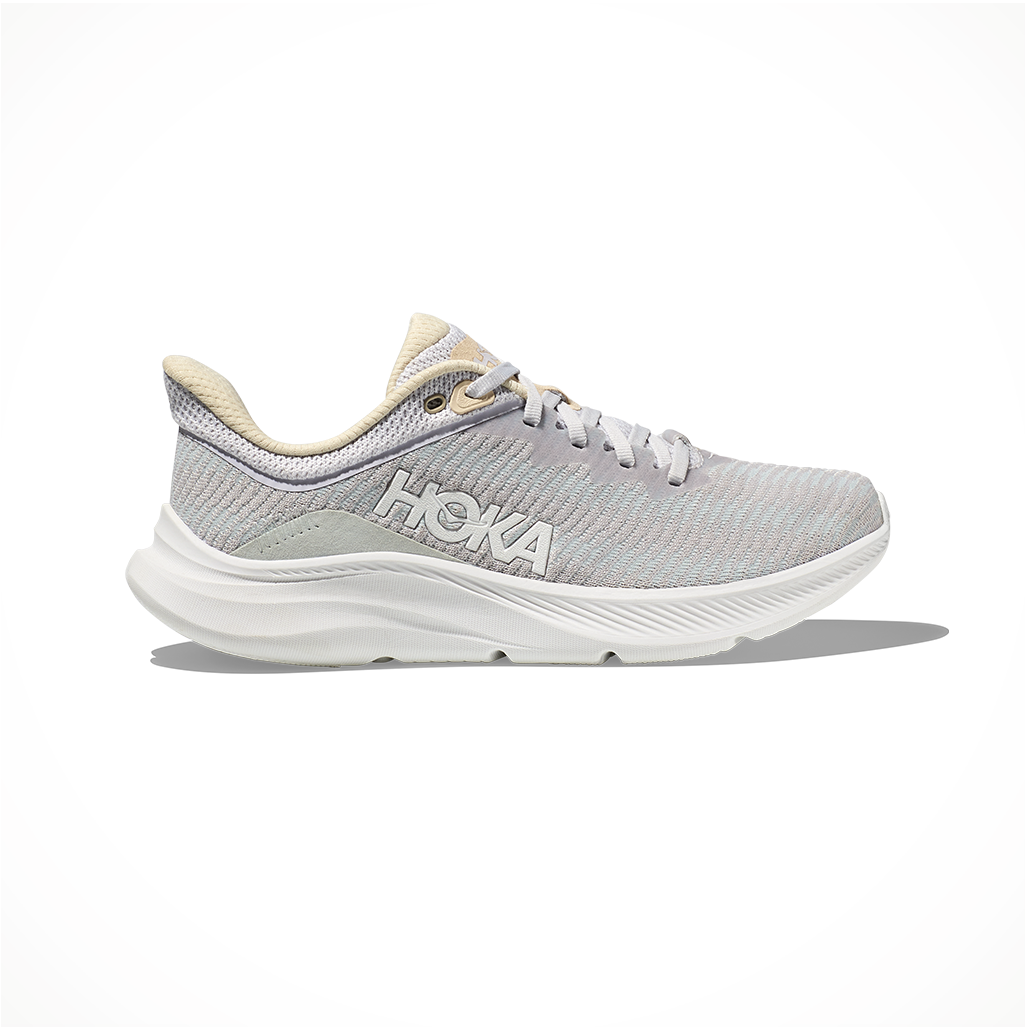 Product image: Footwear Hoka Womens Solimar Nimbus Cloud Shortbread, side profile view.