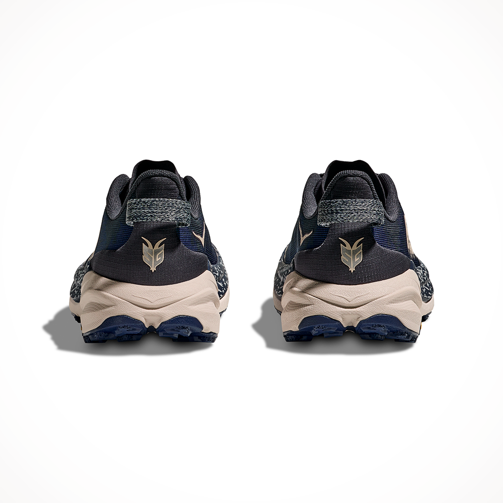 Product image: Hoka Speedgoat 6 Charcoal Grey Midnight Blue Mens 2025, shown from the back.