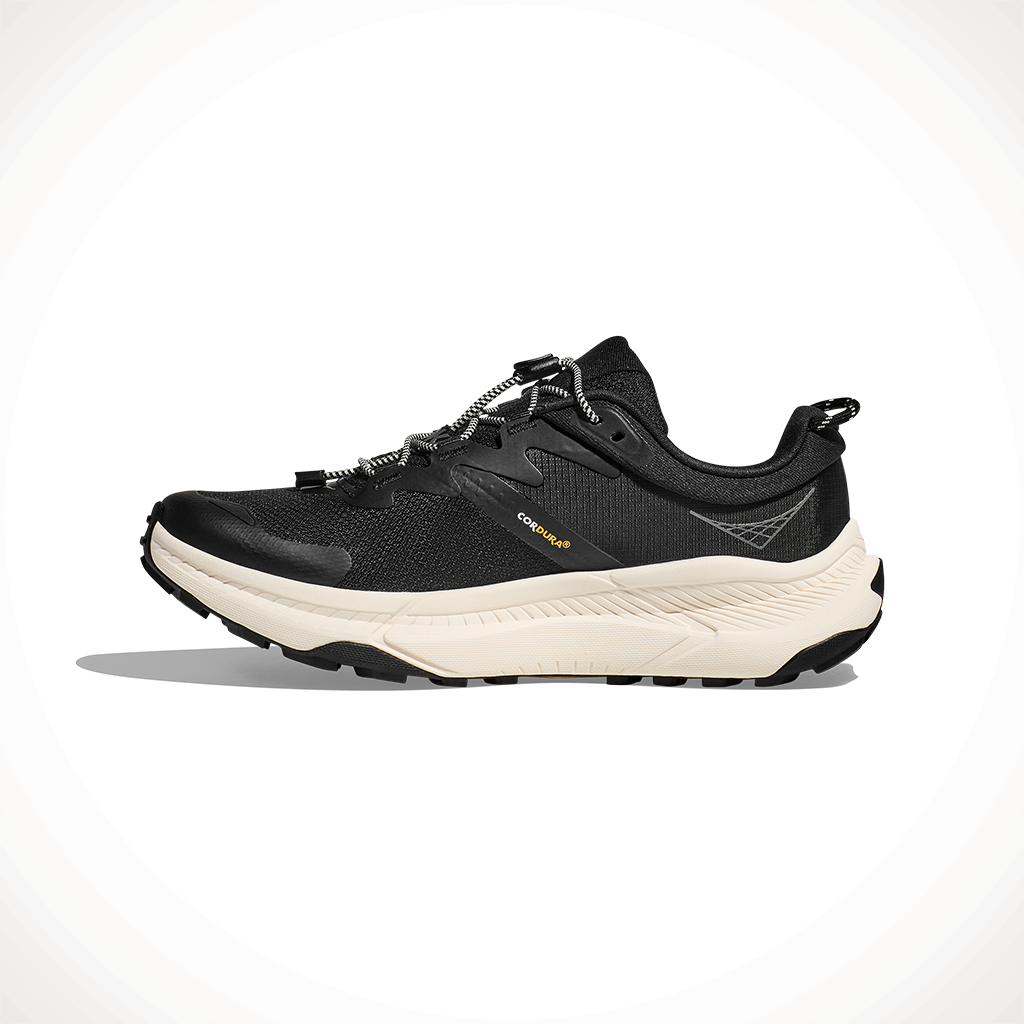 Product image: Hoka Transport Black Alabaster Mens 2025, shown from the left side profile.