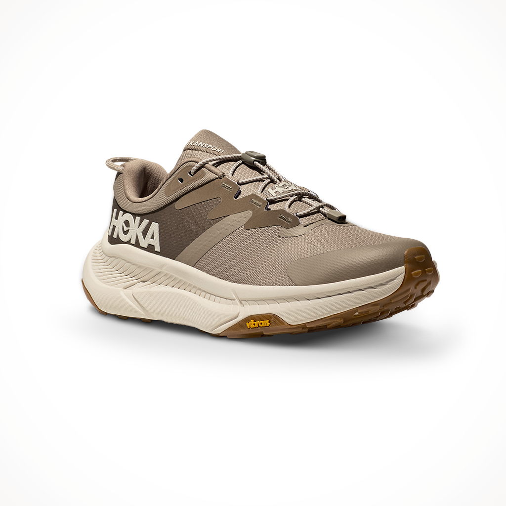 Product image: Hoka Mens Transport Dune Eggnog, shown from a three-quarter angled view.