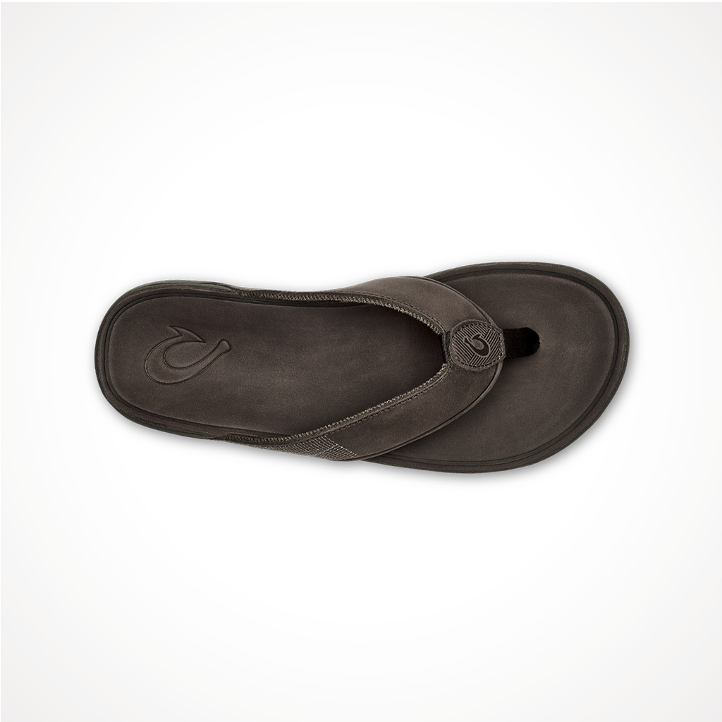 Product image: Footwear Olukai Mens Tuahine Dark Wood, shown from above.