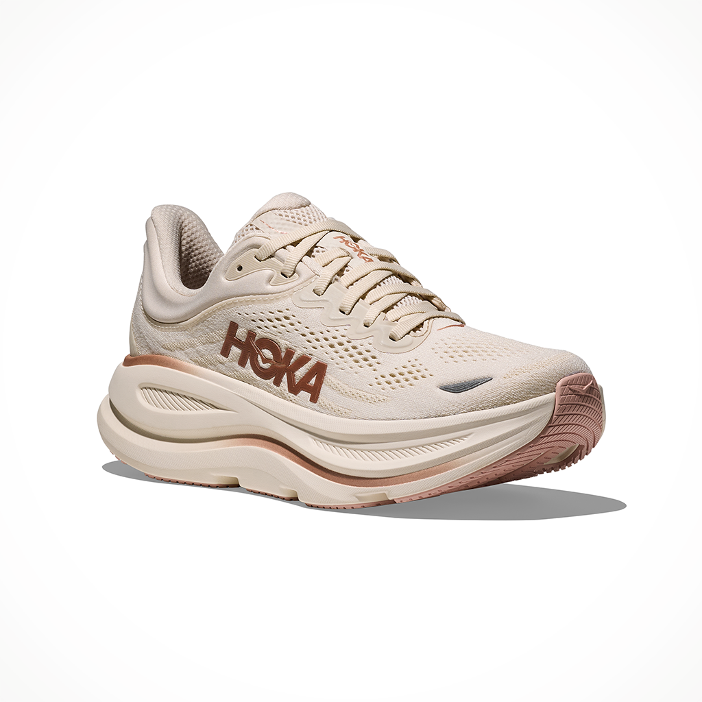 Product image: Hoka Bondi 9 Oat Milk Rose Gold Womens 2026, shown from a three-quarter angled view.
