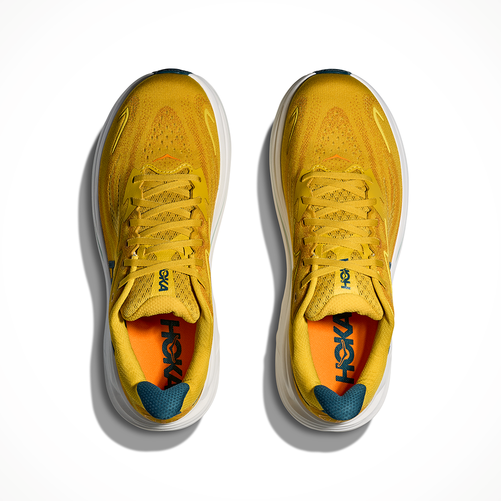 Product image: Hoka Clifton 10 Yellow Gold Tidal Wave Mens 2026, shown as a pair.