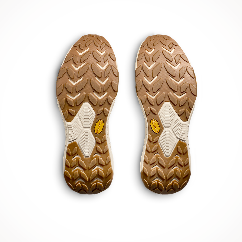 Product image: Hoka Mens Transport Dune Eggnog, showing the outsole tread pattern.