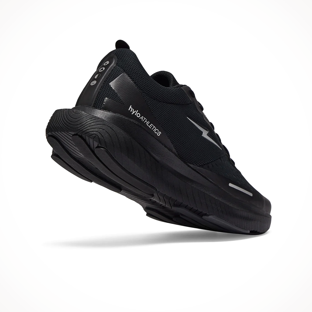 Product image: Hylo Impact Triple Black 2025 Unisex, shown from a three-quarter angled view.