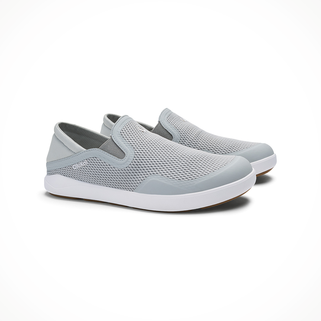 Product image: Olukai Moku Slip On C Loud Grey Ash Mens 2026, shown as a pair.