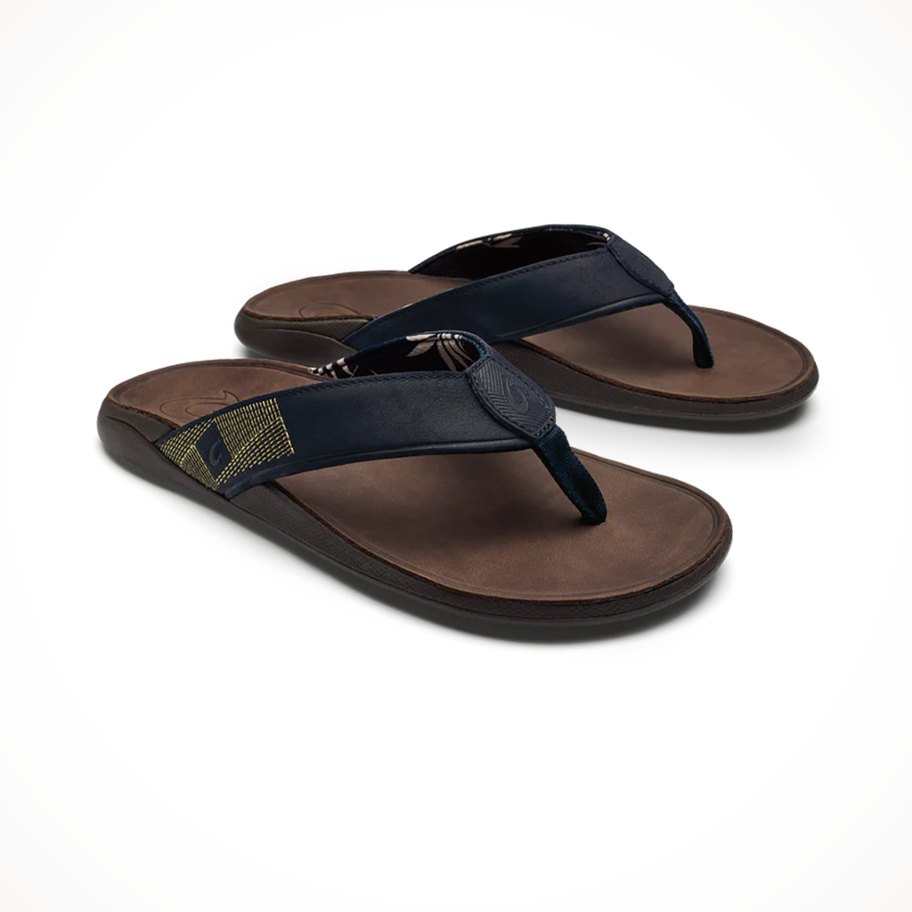 Product image: Olukai Mens Tuahine Trench Blue Dk Wood, shown from a three-quarter angled view.