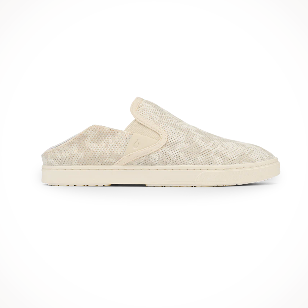 Product image: Olukai Womens Pehuea Puka White Slide.