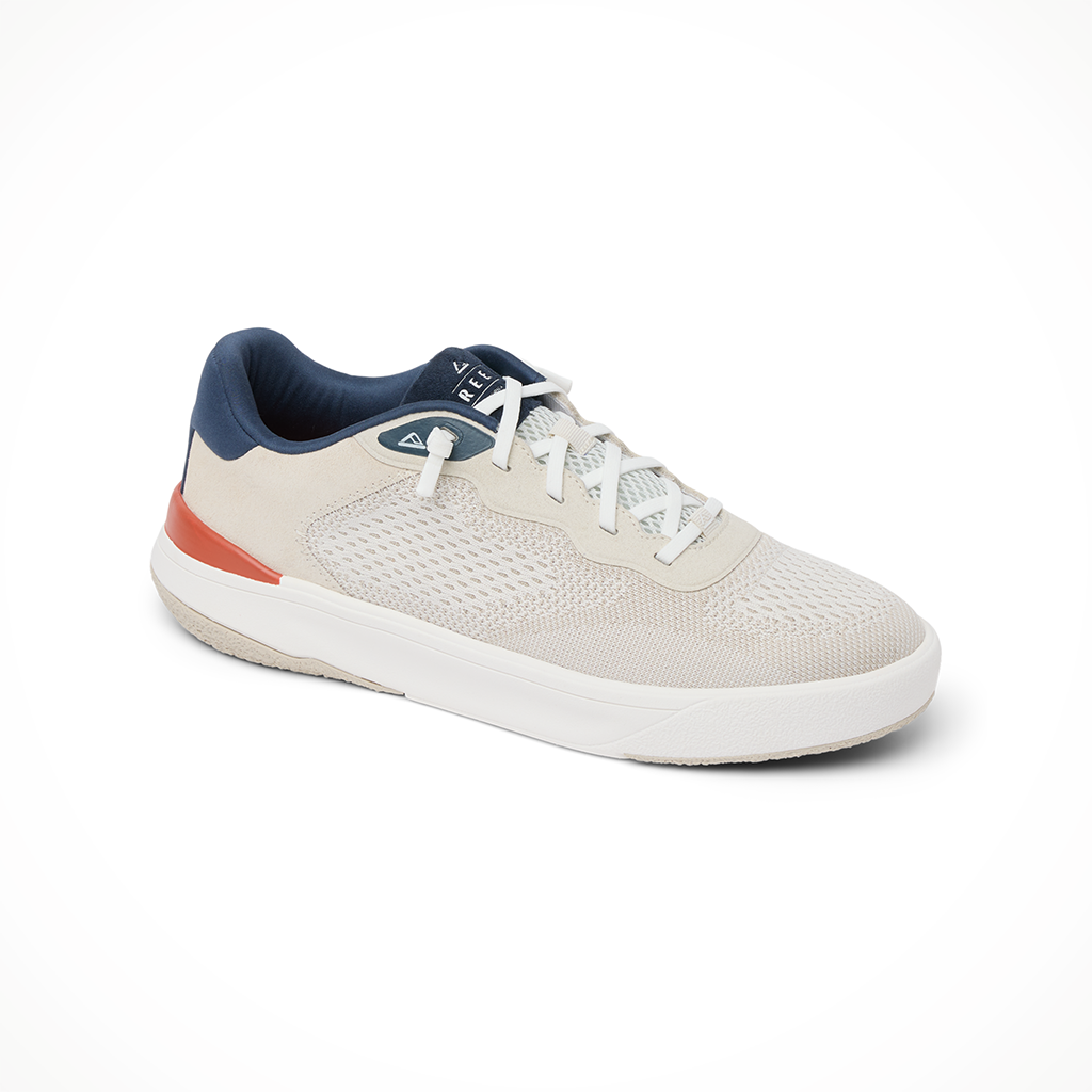 Product image: Reef Shoreline Del Mar Tan W Hite Navy Mens 2026, shown from a three-quarter angled view.