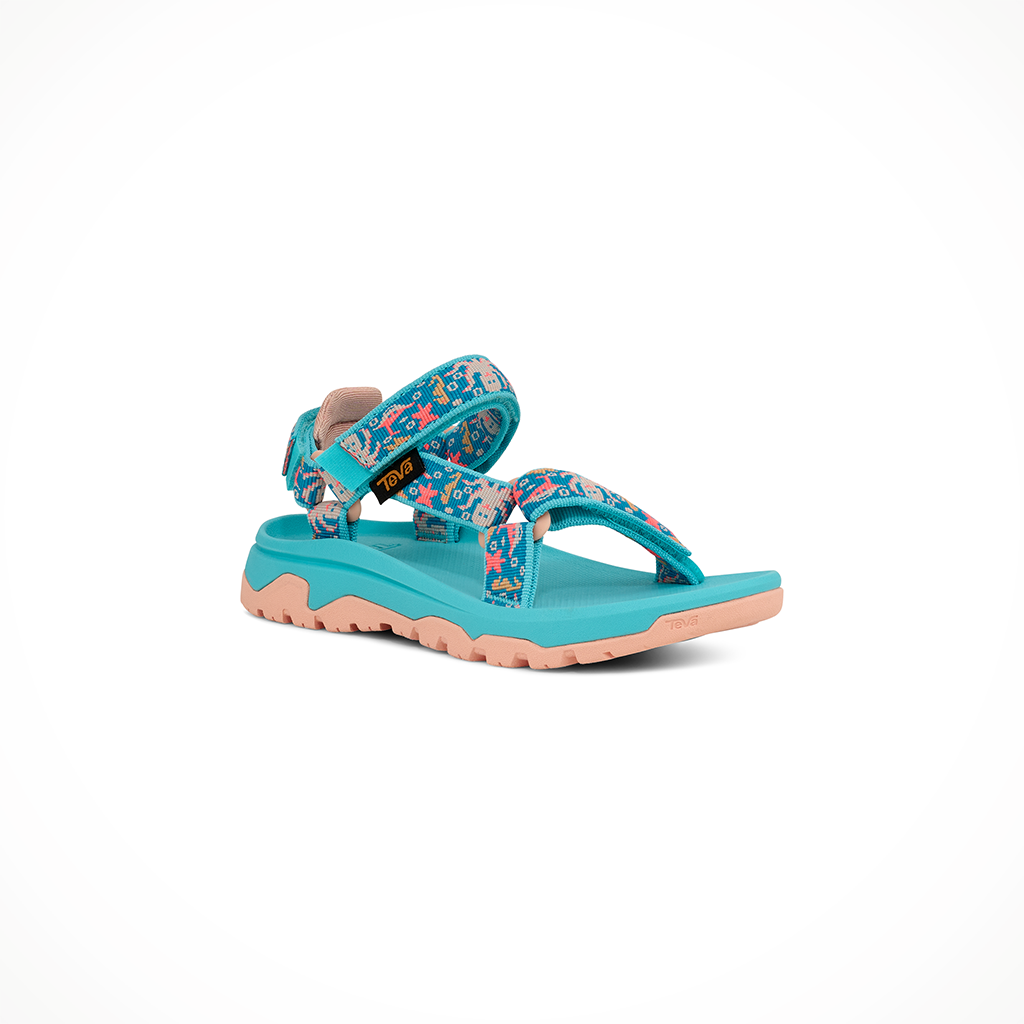 Product image: Teva Hurricane XLT JR Ocean Creatures Blue Radiance Kids 2026, shown from a three-quarter angled view.