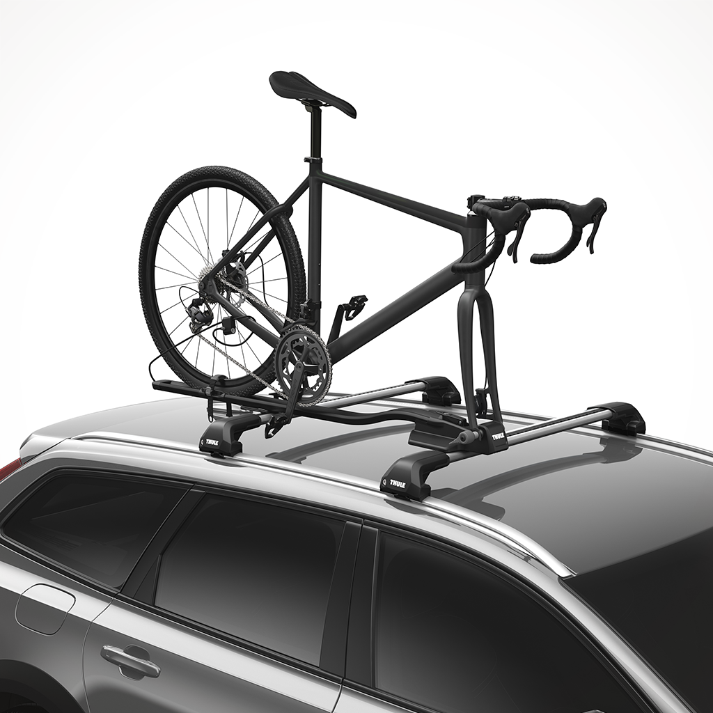 Product image: Thule Fast Ride Roof Bike Rack Black Wheel Car View.