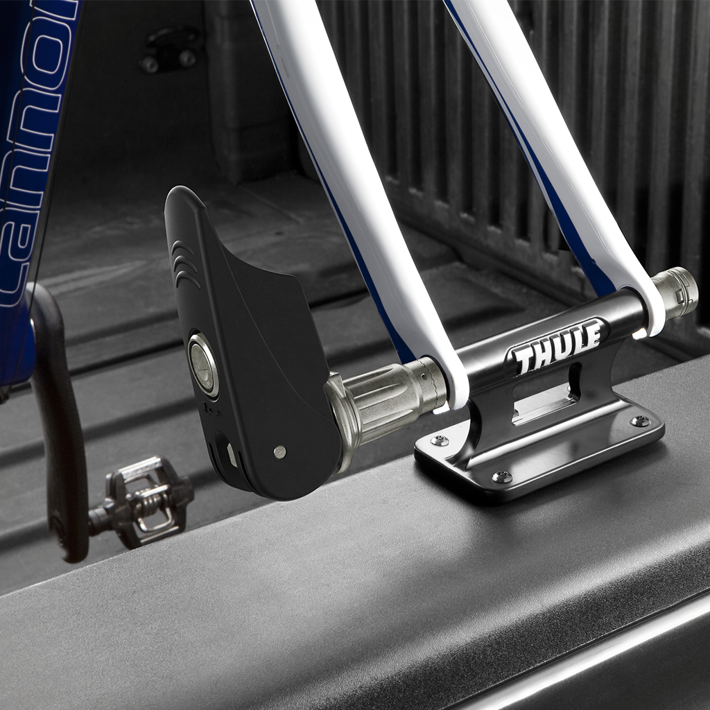 Product image: Thule Locking Low Rider Truck Bike Mount Black On Truck Up Close.